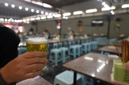 Many Vietnamese stop off at their favourite bar for a few glasses of beer after work