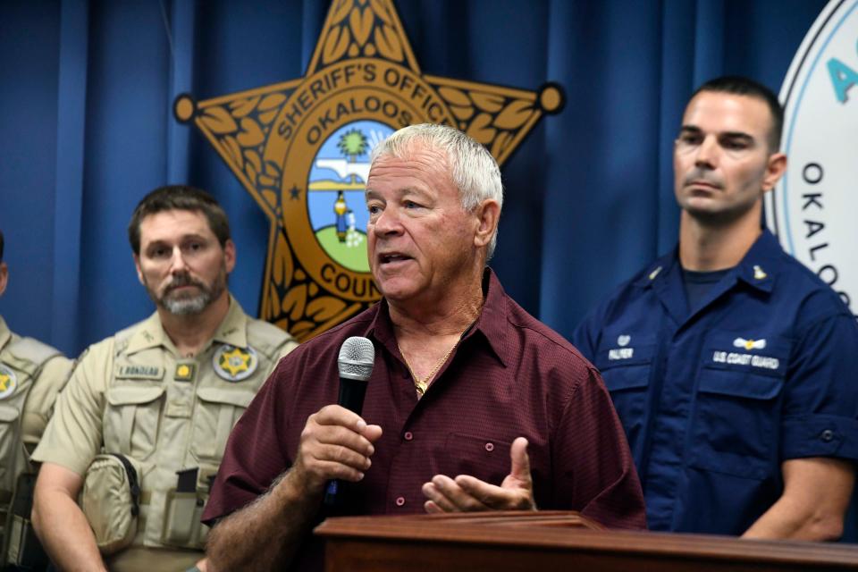 Destin Mayor Gary Jarvis talks about the new Aqua Alert system during a press conference at the Okaloosa County Sheriff's Office on Wednesday.