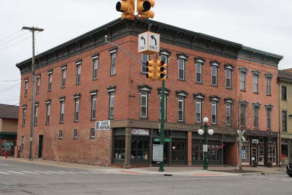 Tecumseh attorney David Stimpson, who is also the Lenawee County Commission chairman, owns these two buildings, pictured Thursday, at the southwest corner of West Chicago Boulevard and South Evans Street in downtown Tecumseh. He bought the Bidwell Exchange building on the corner in 2020 and the building his law office is in in 2006.