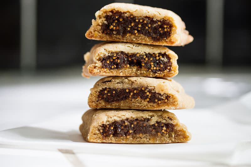 <p><b><b>Fig Newtons</b><br></b></p><p>Make Fig Newtons the way they always should have been. Try these <b><b><a href="https://www.food52.com/blog/9405-fig-newtons-made-at-home?utm_source=yahoofood&utm_medium=referral&utm_campaign=9newyearsevesnacks" rel="nofollow noopener" target="_blank" data-ylk="slk:Fig Newtons;elm:context_link;itc:0;sec:content-canvas" class="link ">Fig Newtons</a>.</b></b> <i>(Photo: Megan Scott/Food52)</i></p>