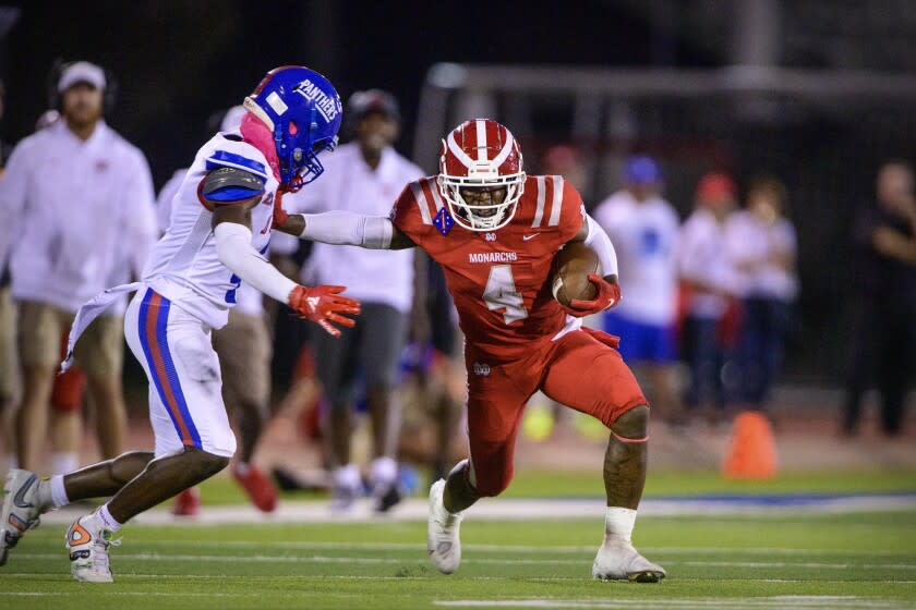 Duncanville, TX - August 27: Mater Dei Monarchs running back Raleek Brown (4) runs for a first down against the Duncanville Panthers during the game in Panther Stadium on Friday, Aug. 27, 2021 in Duncanville, TX. (Jerome Miron / For the LA Times)