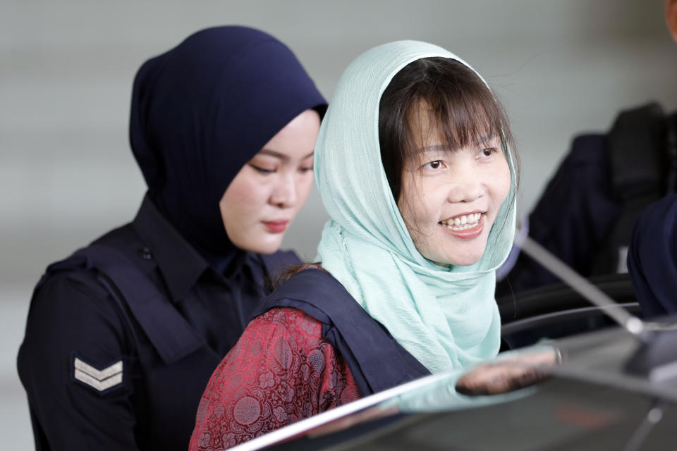 In this Monday, April 1, 2019, file photo, Vietnamese Doan Thi Huong, right, leaves Shah Alam High Court in Shah Alam, Malaysia. The Vietnamese woman who is the only suspect in custody for the killing of the North Korean leader's brother Kim Jong Nam pleaded guilty to a lesser charge in a Malaysian court on Monday and her lawyer said she could be freed as early as next month. (AP Photo/Vincent Thian, File)