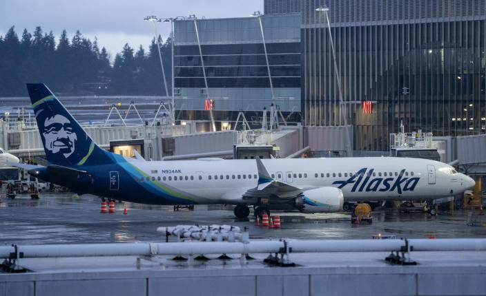 SEATTLE, WASHINGTON - JANUARY 6: An Alaska Airlines Boeing 737 MAX 9 plane sits at a gate at Seattle-Tacoma International Airport on January 6, 2024 in Seattle, Washington. Alaska Airlines grounded its 737 MAX 9 planes after part of a fuselage blew off during a flight from Portland Oregon to Ontario, California. (Photo by Stephen Brashear/Getty Images)