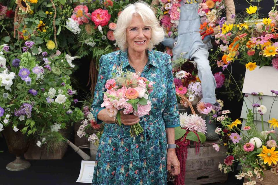 Camilla, Duchess of Cornwall smiles during a visit to The Sandringham Flower Show 2022