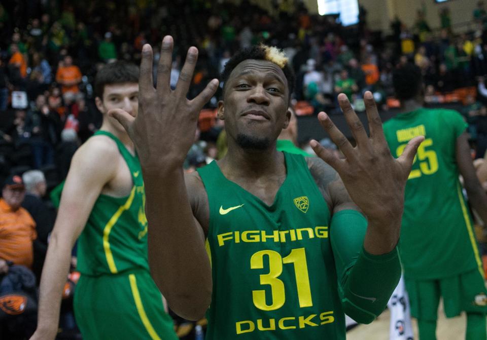 Oregon's Dylan Ennis (31) celebrates after Oregon defeated Oregon State 80-59 in an NCAA college basketball game Saturday, March 4, 2017, in Corvallis, Ore. (AP Photo/Timothy J. Gonzalez)