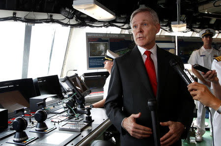 FILE PHOTO: U.S. Secretary of the Navy Ray Mabus speaks to reporters in the bridge of the USS Freedom littoral combat ship during a visit at Changi Naval Base in Singapore May 11, 2013. REUTERS/Edgar Su/File Photo