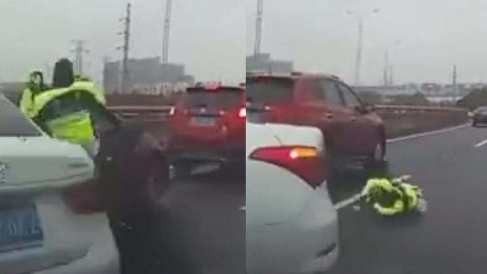 一輛失控打滑的白色轎車衝撞正在指揮的交警，造成該名交警當場被撞飛。（圖／翻攝自am730）
