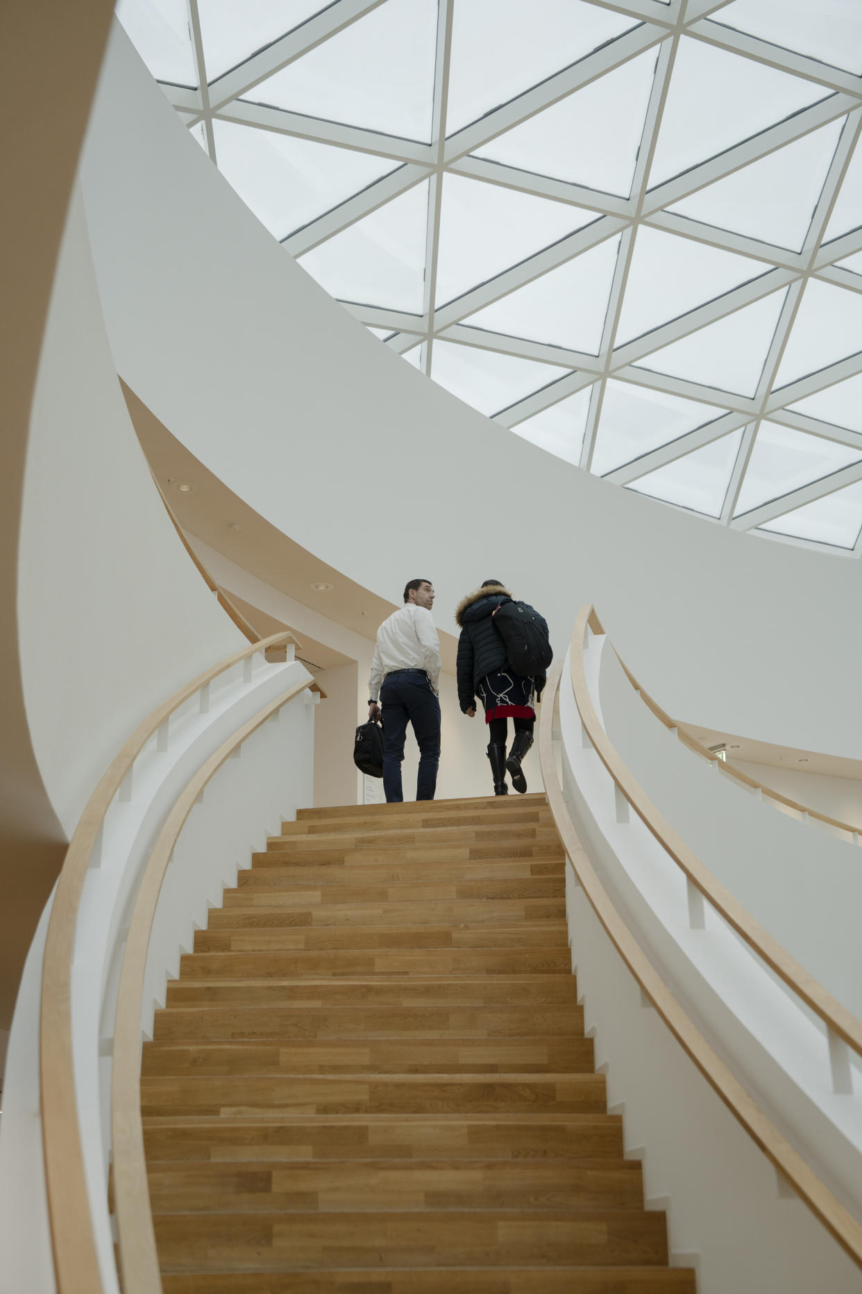 Employees walk at Novo Nordisk headquarters building in Bagsv¾rd, Denmark on Feb. 9, 2024. (Charlotte de la Fuente/The New York Times)