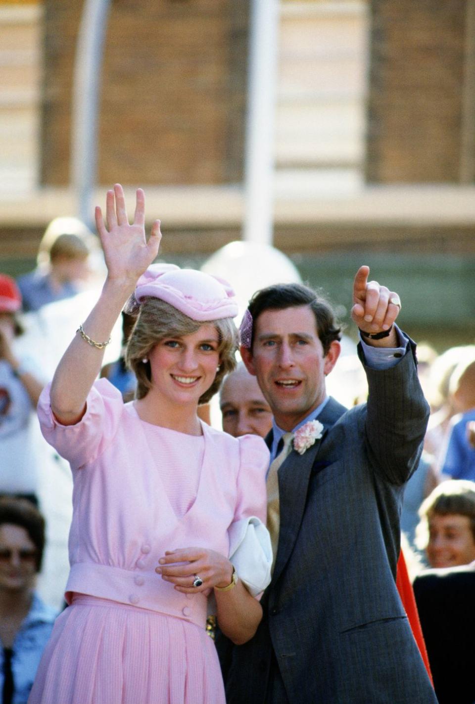 <p>Charles and Diana wave to a crowd in Newcastle, Australia. </p>