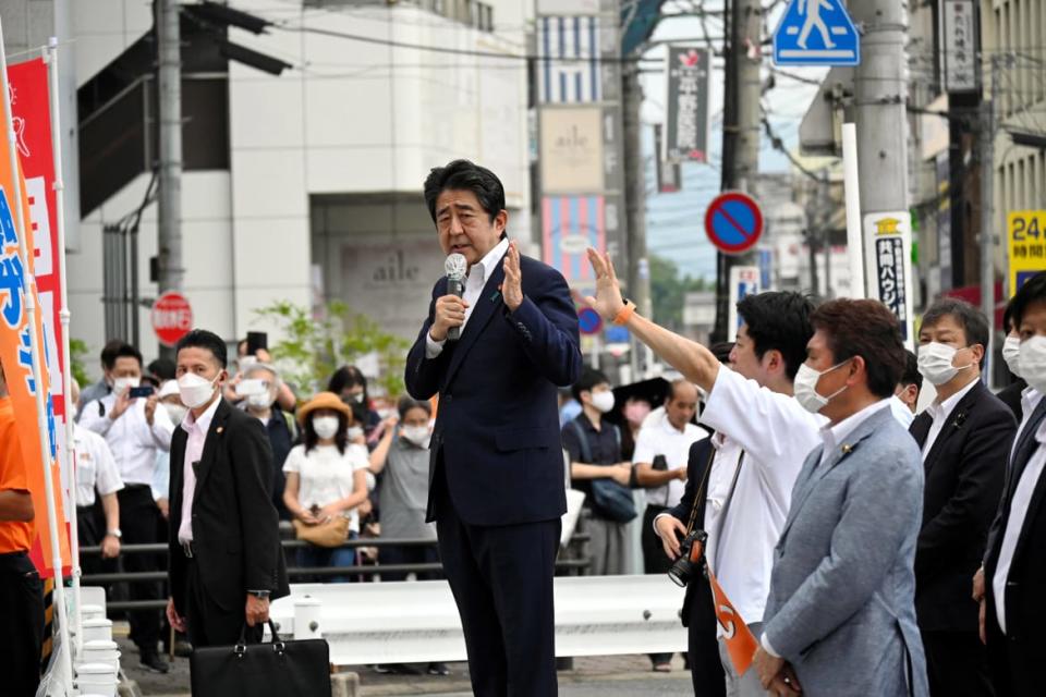<div class="inline-image__caption"><p>Former Japanese Prime Minister Shinzo Abe makes a speech before he was shot from behind by a man in Nara, western Japan July 8, 2022.</p></div> <div class="inline-image__credit">The Asahi Shimbun/via REUTERS</div>