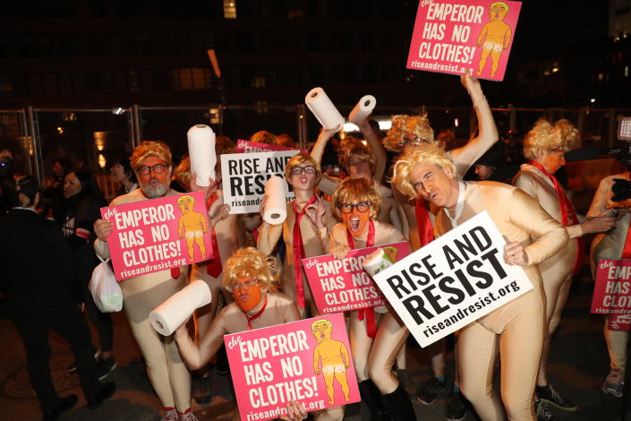 <p>A group anti-Trump protesters from “Rise and Resist” pose for a photo before the Village Halloween Parade in New York City on Oct. 31, 2017. (Photo: Gordon Donovan/Yahoo News) </p>