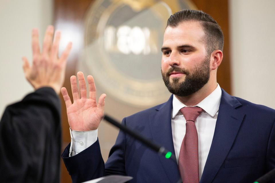 Leon County Commission Christian Caban takes his oath of office on Tuesday, Nov. 22, 2022 in Tallahassee, Fla. 