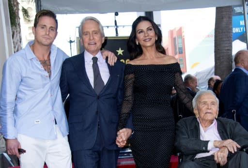 (L-R) Cameron Douglas, Michael Douglas, Catherine Zeta-Jones and Kirk Douglas in November 2018 at a ceremony unveiling a star on the Hollywood Walk of Fame for Michael Douglas
