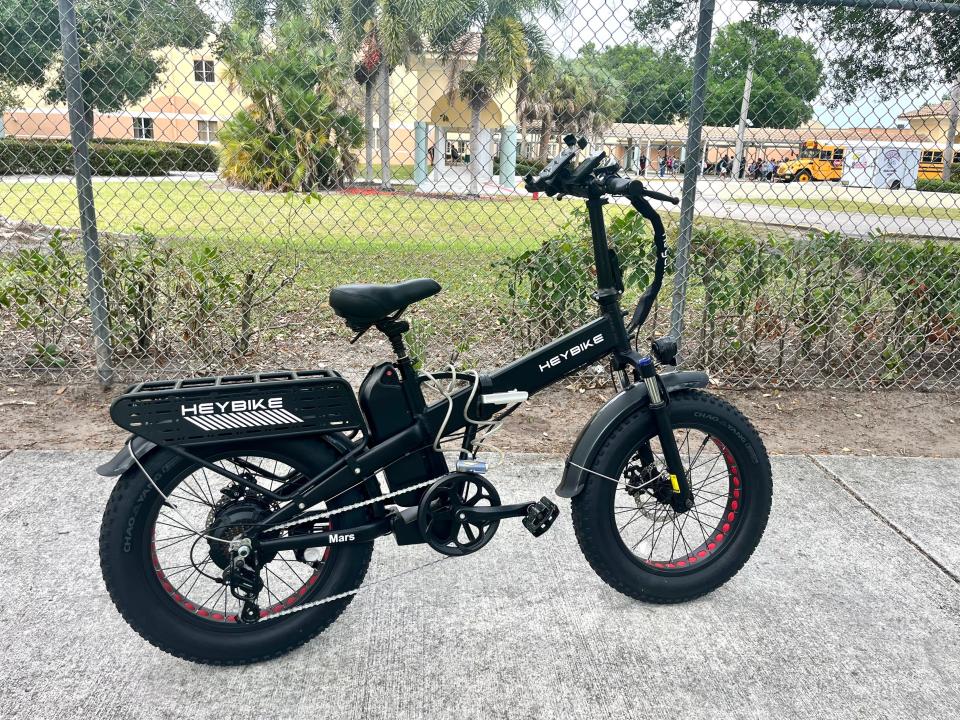 An electric bicycle sits outside of Independence Middle School in Jupiter, Fla., on April 11, 2024.