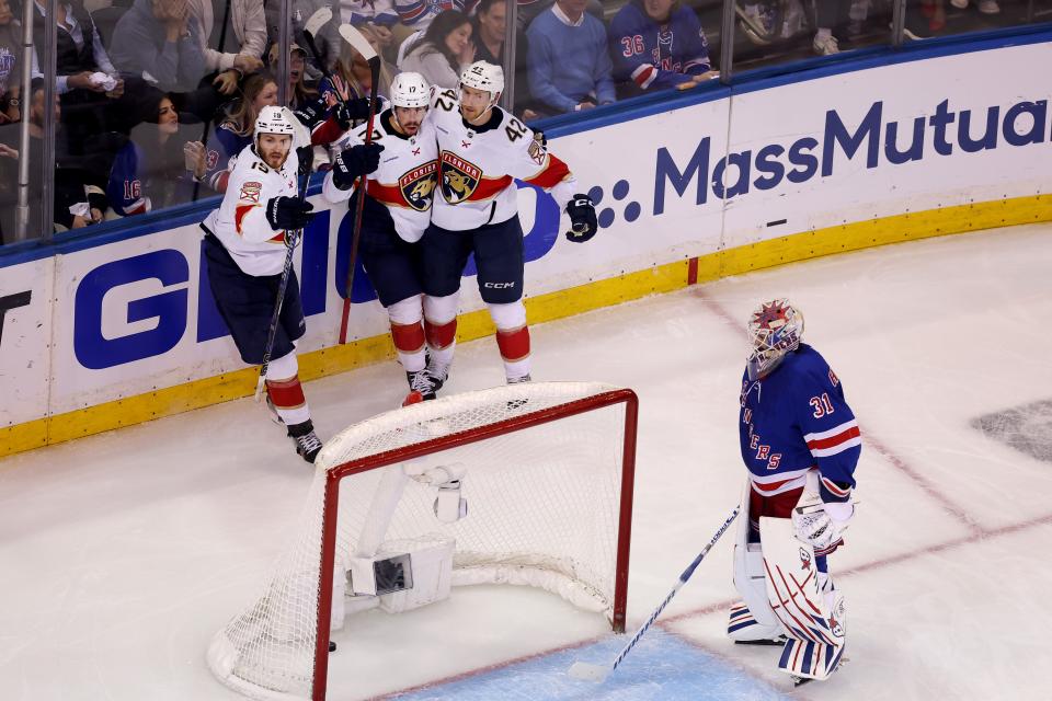 May 30, 2024; New York, New York, USA; Florida Panthers defenseman Gustav Forsling (42) celebrates his goal against New York Rangers goaltender Igor Shesterkin (31) with center Evan Rodrigues (17) and left wing Matthew Tkachuk (19) during the second period of game five of the Eastern Conference Final of the 2024 Stanley Cup Playoffs at Madison Square Garden. Mandatory Credit: Brad Penner-USA TODAY Sports