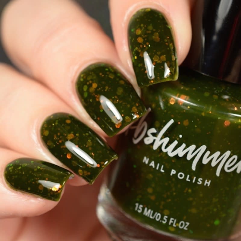 You don't need the skills of a nail artist to mix in a little metal with a fall-friendly shade like moss green. The high-shine <a href="https://www.kbshimmer.com/squadghouls-nail-polish/" rel="nofollow noopener" target="_blank" data-ylk="slk:KB Shimmer shade #squadghouls;elm:context_link;itc:0;sec:content-canvas" class="link ">KB Shimmer shade #squadghouls</a> doesn't just have a name that's made for the Halloween season, it has built-in golden glitter that makes it a no-brainer this time of year.