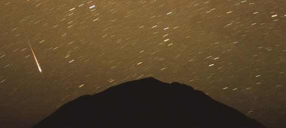 Photographer Chris Gruhusko captured this view of the Leonid meteor shower in November 2001 over the north face of Wind Mountain in the Cornudas Mountain of Southern New Mexico.