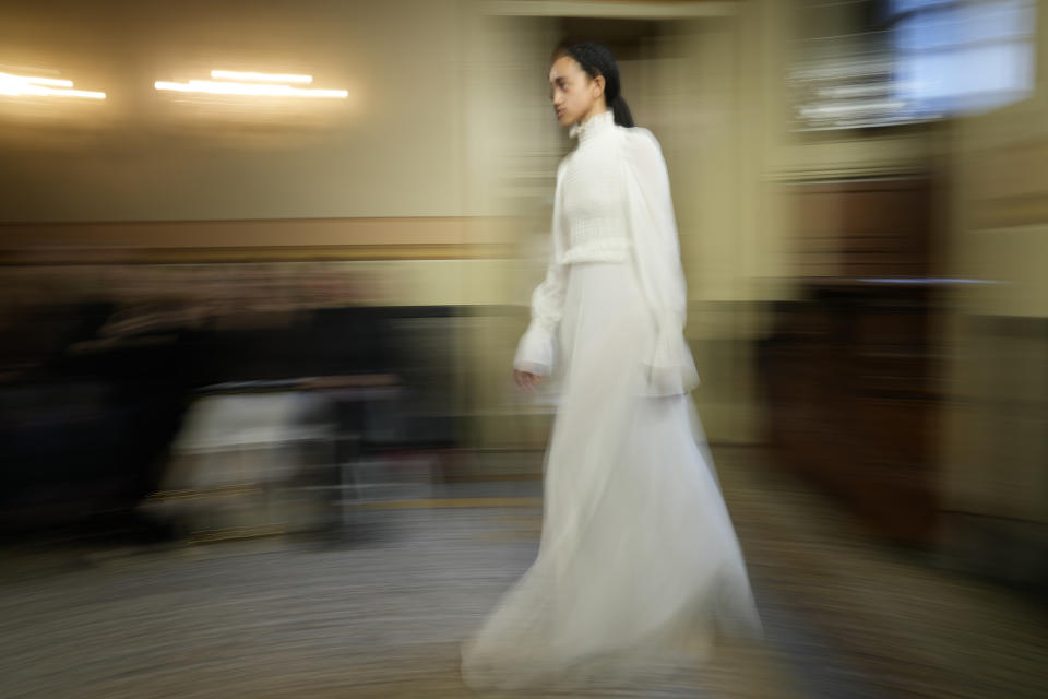 A model wears a creation as part of the Blumarine women's Fall-Winter 2024-25 collection presented in Milan, Italy, Friday, Feb. 23, 2024. (AP Photo/Antonio Calanni)