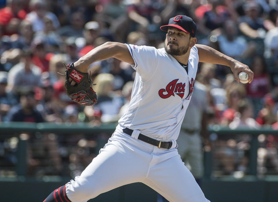 Cleveland Indians relief pitcher Brad Hand delivers to Texas Rangers' Logan Forsythe during the ninth inning of the first game of a baseball doubleheader in Cleveland, Wednesday, Aug. 7, 2019. Hand struck out the side in the ninth for a 2-1 win. (AP Photo/Phil Long)