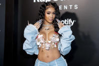 <p>From her manicure to her bra top to her glittering chains, Saweetie brings the bling at Hulu's RapCaviar Presents red carpet event on March 23 in Los Angeles.</p>