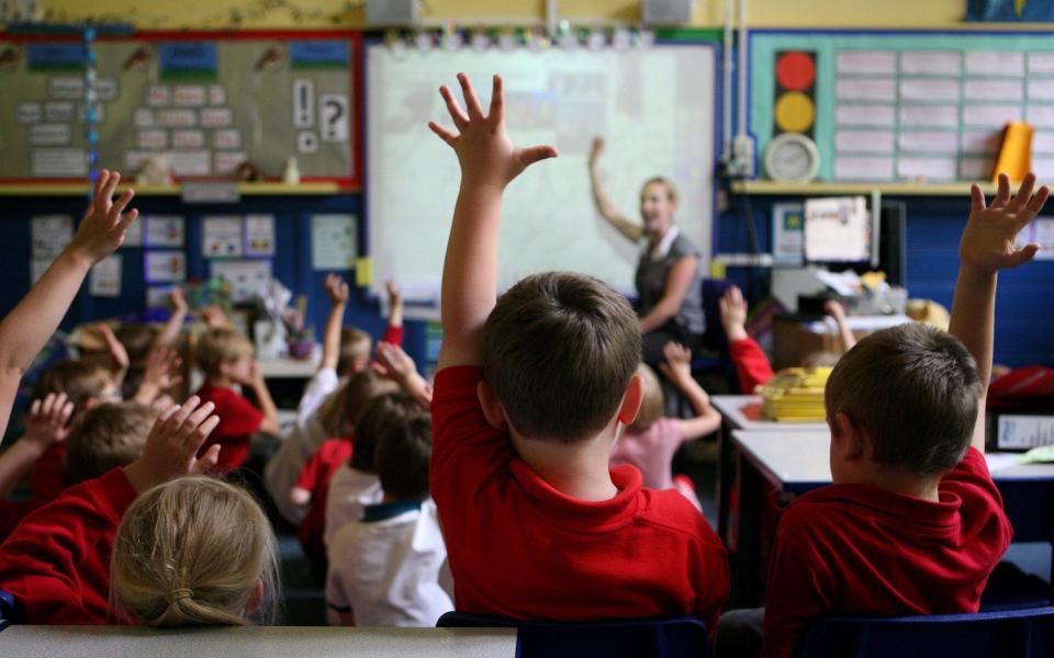 A teacher in a classroom - Credit: Dave Thompson/PA