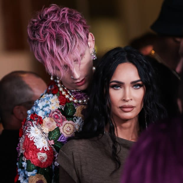 <p>IMAGO / agefotostock</p><p>Actress <strong><a href="https://parade.com/news/megan-fox-fiercely-defends-see-through-jean-paul-gaultier-dress-racy-instagram-pic" rel="nofollow noopener" target="_blank" data-ylk="slk:Megan Fox;elm:context_link;itc:0;sec:content-canvas" class="link ">Megan Fox</a></strong> and musician <strong>Machine Gun Kelly</strong> may be better placed on a “weirdest celebrity couples” list, but you can't argue that they absolutely dominated headlines in 2020 with their new relationship. They met on set that year and began dating shortly thereafter, with Fox appearing in Kelly’s music video for the song <em>Bloody Valentine</em>. </p><p>Most of the fanfare around their coupling was about the passionate/bizarre comments Fox and Kelly made in interviews, sparking rumors that the relationship was a PR stunt. Fox called Kelly her “twin flame” in a <a href="https://www.stitcher.com/show/give-them-lala-with-randall/episode/and-megan-fox-and-machine-gun-kelly-76367584#/" rel="nofollow noopener" target="_blank" data-ylk="slk:July 2020 podcast;elm:context_link;itc:0;sec:content-canvas" class="link ">July 2020 podcast</a>. "Loving him is like being in love with a tsunami or a forest fire," she <a href="https://www.nylon.com/life/megan-fox-machine-gun-kelly-love-declarations-timeline#:%7e:text=Fox%3A%20%22Loving%20him%20is%20like,with%20reverence%20and%20with%20gratitude.%22" rel="nofollow noopener" target="_blank" data-ylk="slk:told Nylon;elm:context_link;itc:0;sec:content-canvas" class="link ">told <em>Nylon</em></a> in November.</p><p>They got engaged in early 2022, got matching ring-finger tattoos that May, broke up for a period in 2023 but appear to be back together.</p>