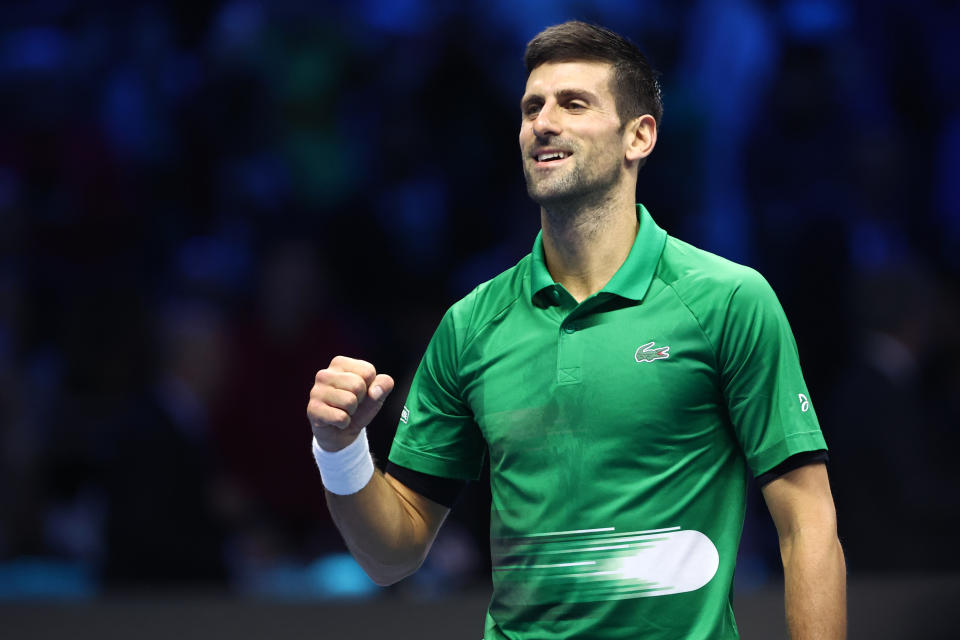 Novak Djokovic (pictured) celebrates the ATP Finals win.