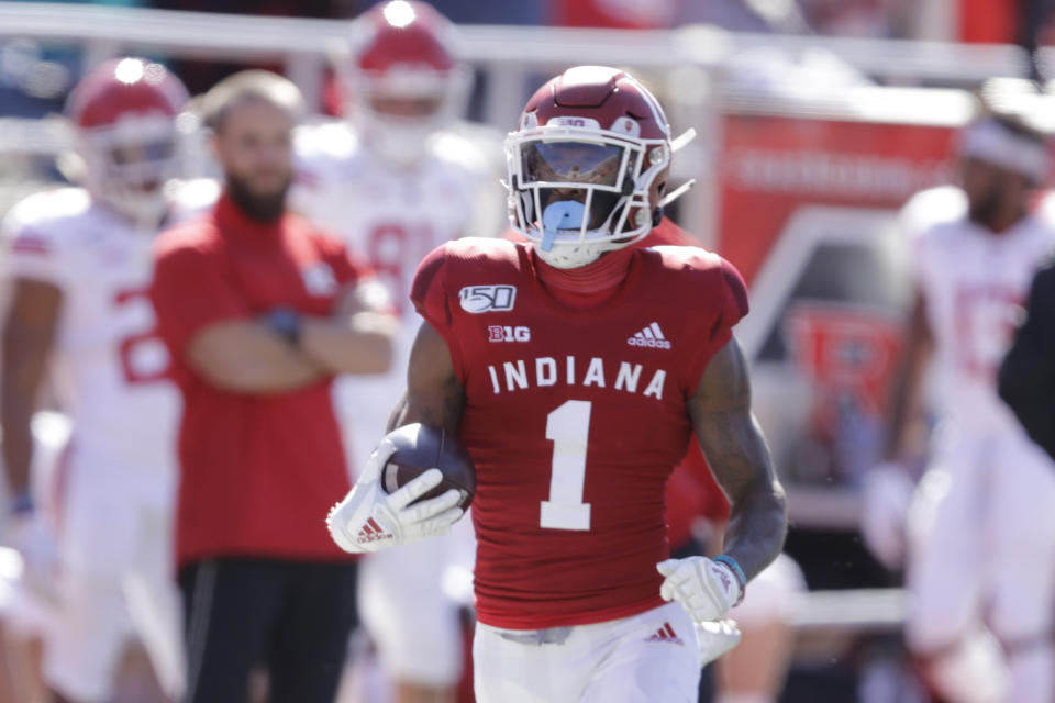 In this photo taken on Saturday, Oct. 12, 2019, Indiana wide receiver Whop Philyor (1) runs during the first half of an NCAA college football game against Rutgers, in Bloomington, Ind. The Hoosiers could be headed to a second straight bowl game despite a brutal schedule that begins with Penn State visiting Bloomington, Indiana, on Oct. 24.(AP Photo/Darron Cummings)