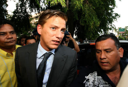 Alexandre Ventura Nogueira (C) arrives at the Office of the Attorney General in Panama City, Panama April 16, 2009. To match Special Report USA-TRUMP/PANAMA Jorge Fernandez/Courtesy of La Prensa/Handout via REUTERS