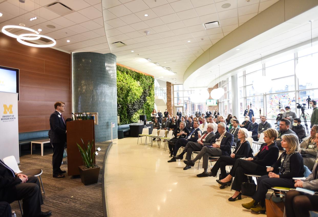 Sparrow Health System President and CEO James F. Dover speaks Friday, Dec. 9, 2022, during a press conference at Sparrow Hospital where he and other officials spoke about a new partnership with University of Michigan Health.