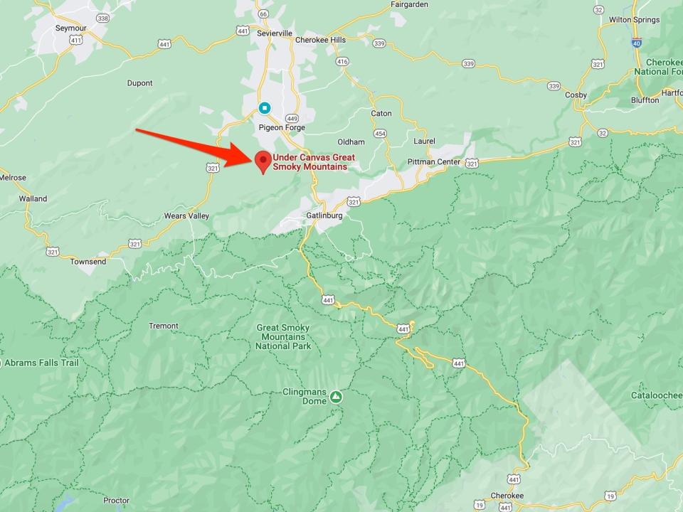 A map of the Great Smoky Mountains and surrounding areas with a red arrow pointing to Under Canvas Resort