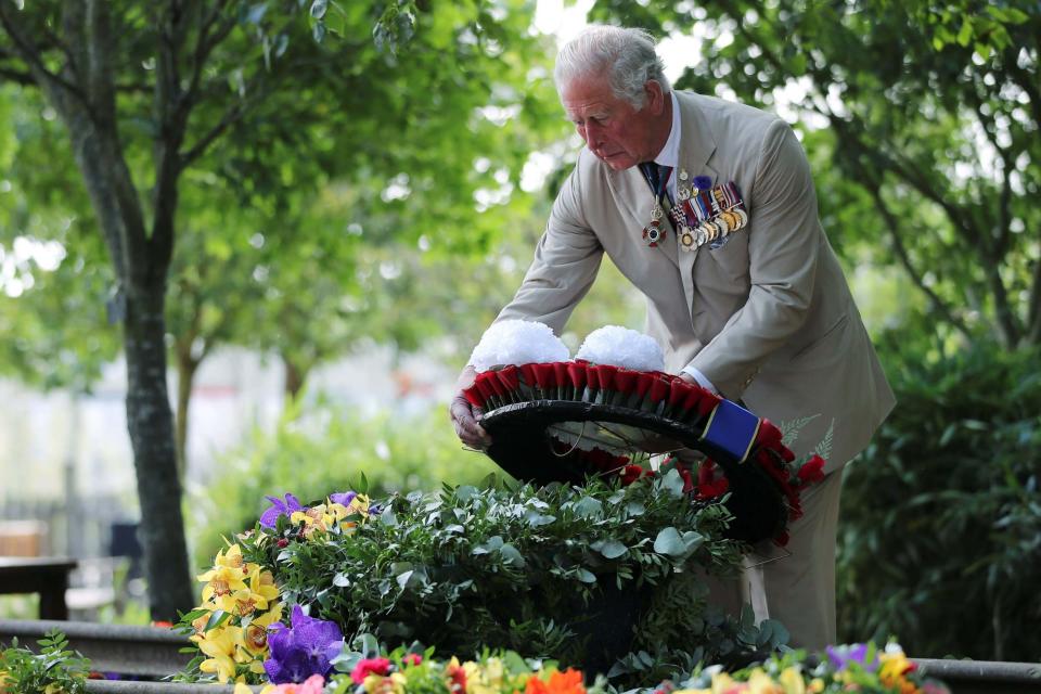 Prince Charles lays a wreath at the National Memorial Arboretum in Alrewas, Staffordshire (PA)