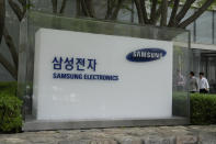 The logo of the Samsung Electronics Co. is seen at its office in Seoul, South Korea, Tuesday, April 30, 2024. Samsung Electronics on Tuesday reported a 10-fold increase in operating profit for the last quarter as the expansion of artificial intelligence technologies drives a rebound in the markets for computer memory chips.(AP Photo/Ahn Young-joon)