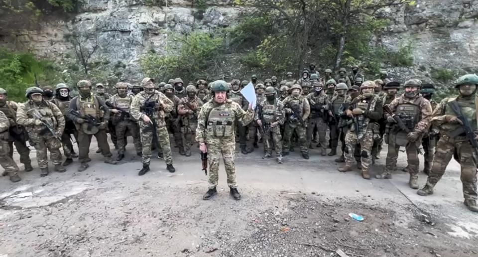 FILE - In this image taken from video released by the Prigozhin Press Service on May 5, 2023, head of Wagner Group Yevgeny Prigozhin reads a statement with his troops in an unknown location. When Prigozhin launched his armed rebellion that challenged the Kremlin, Western officials predicted Russian President Vladimir Putin would seek vengeance against the mercenary leader. Although authorities have not yet confirmed the death of Prigozhin and his top lieutenants in Wednesday's plane crash northwest of Moscow, it sent an immediate chill through Russian official circles. The message was clear: Anyone who dares to cross the Kremlin will perish. (Prigozhin Press Service via AP, File)