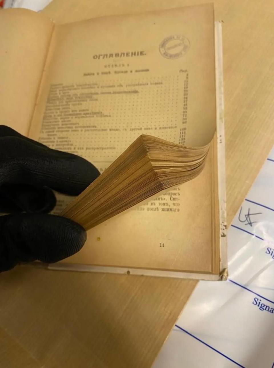 An antique book confiscated by police during the raids. Photo from Europol