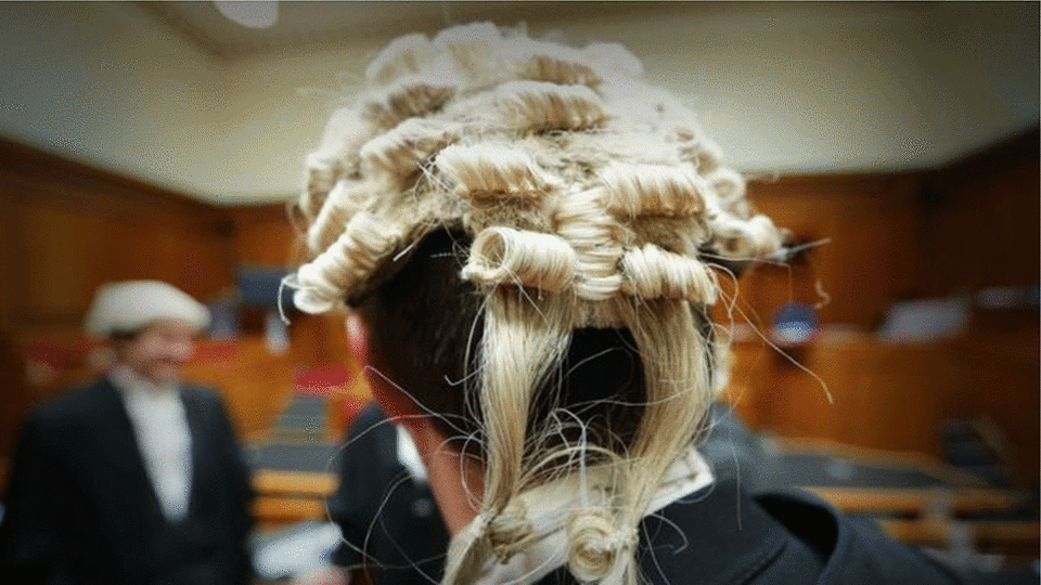 Bewigged lawyers in court