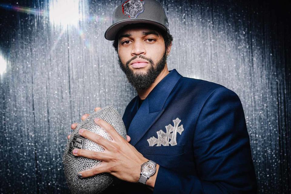 <p>Todd Rosenberg/Getty Images</p> Quarterback Caleb Williams of USC poses for portraits after being selected first overall in the 2024 NFL draft