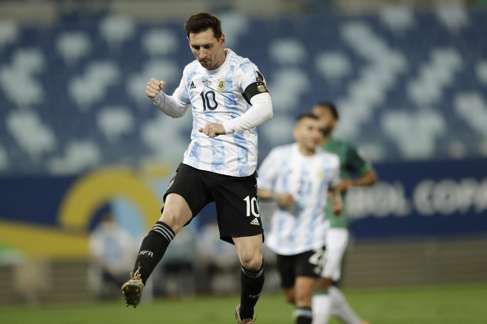 Argentina's Lionel Messi celebrates scoring his side's second goal from the penalty spot during a Copa America soccer match against Bolivia at Arena Pantanal stadium in Cuiaba, Brazil, Monday, June 28, 2021. (AP Photo/Bruna Prado)