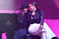 Sara Bareilles and Alicia Keys share a moment onstage during the City of Hope Spirit of Life Gala 2019 in Santa Monica, California, on Thursday night. 