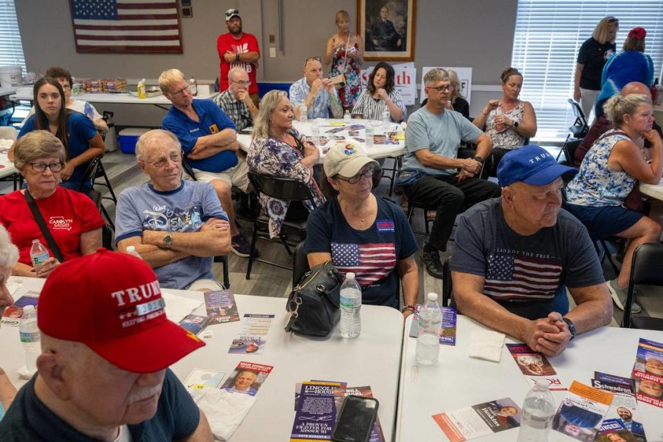 Members of the Jackson County Republican Party listened as candidates spoke at an ice cream social in Kansas City on Sunday, July 14, 2022. Several candidates mentioned the attempted assassination of former President Donald Trump.