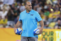 Argentina's coach Mario Ledesma watches his players warm up ahead of the Rugby Championship test match between the Pumas and the Wallabies in Townsville, Australia, Saturday, Sept. 25, 2021. (AP Photo/Tertius Pickard)