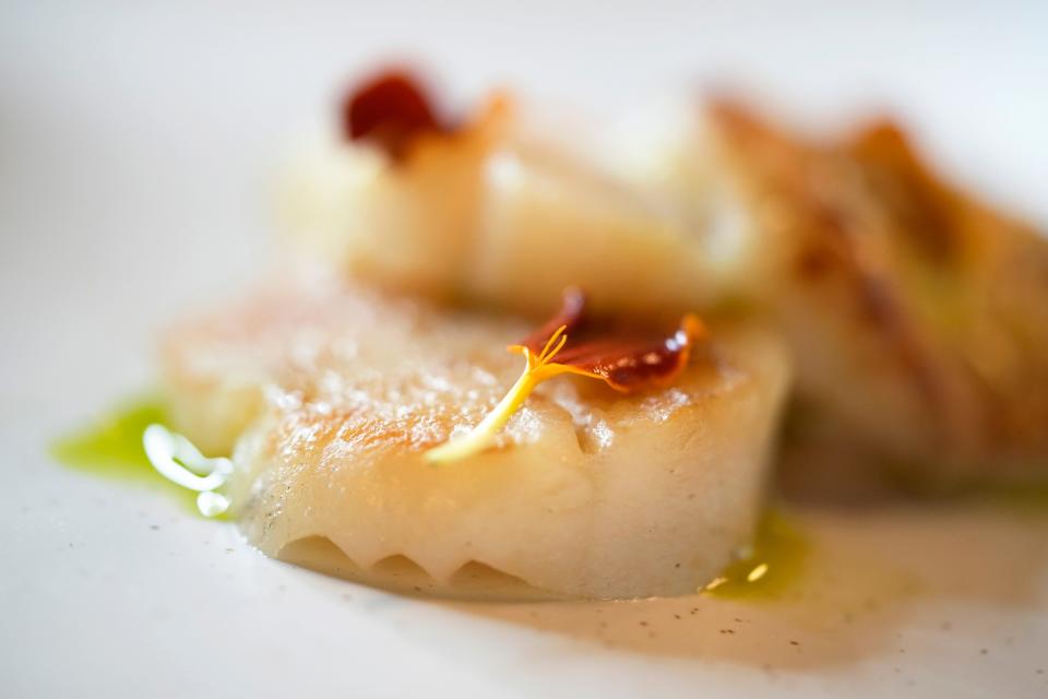 Aug. 1, 2023; Columbus, Oh., USA;  Smoked scallop served as part of a chilled seafood plate at Hiraeth.