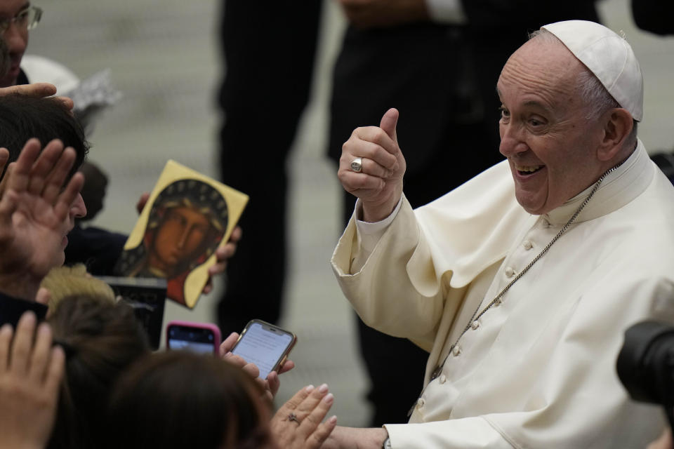 FILE - Pope Francis gives the thumbs up as he leaves after his weekly general audience in the Paul VI Hall at the Vatican, Sept. 22, 2021. Pope Francis is celebrating his 85th birthday Friday, Dec. 17, 2021, a milestone made even more remarkable given the coronavirus pandemic, his summertime intestinal surgery and the weight of history: His predecessor retired at this age and the last pope to have lived any longer was Leo XIII over a century ago. (AP Photo/Alessandra Tarantino, file)