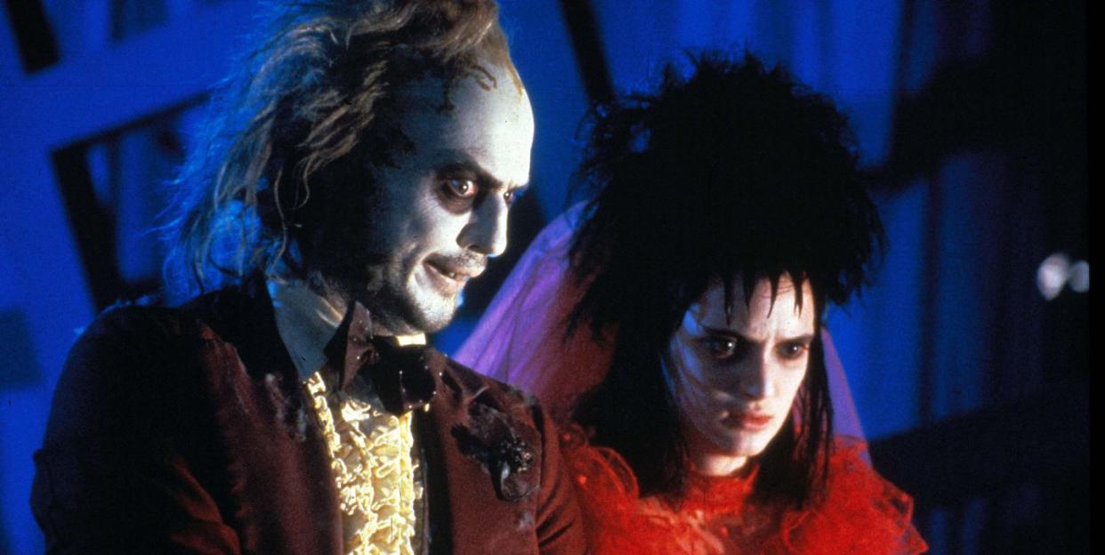 michael keaton as beetlejuice and winona ryder as lydia