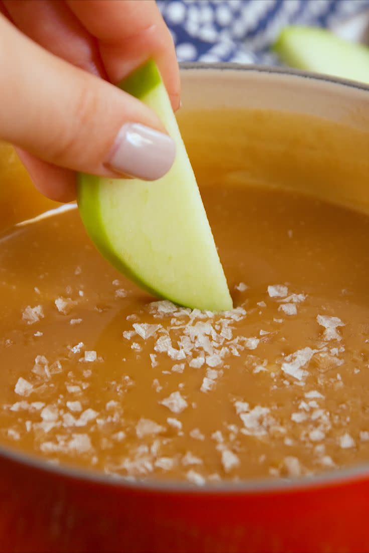 <p>Don't mind if we fonDUE!</p><p>Get the recipe from <a href="https://www.delish.com/cooking/recipe-ideas/recipes/a51660/salted-caramel-fondue-recipe/" rel="nofollow noopener" target="_blank" data-ylk="slk:Delish;elm:context_link;itc:0;sec:content-canvas" class="link ">Delish</a>.</p>