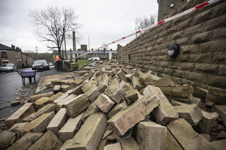 STALYBRIDGE, ENGLAND - DECEMBER 28: Debris from a wall damaged by a tornado is seen on December 28, 2023 in Stalybridge, England. Houses in the Tameside area of Greater Manchester have been damaged by a localised tornado during Storm Gerrit. Police declared a major incident last night as roofs were torn off the houses and trees uprooted, but no reported injuries. (Photo by Ryan Jenkinson/Getty Images)
