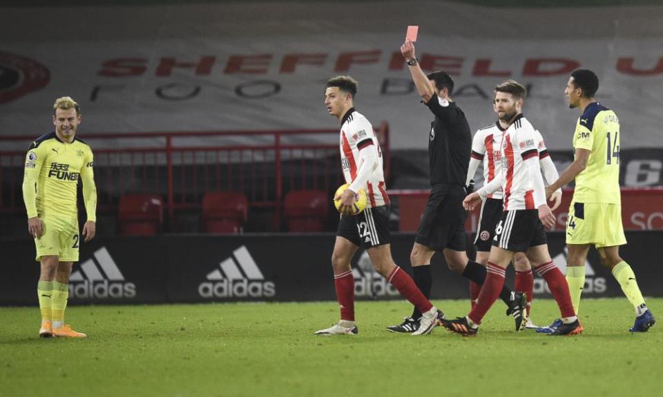 Newcastle’s Ryan Fraser is sent off after seeing a second yellow card for a foul on John Lundstram.