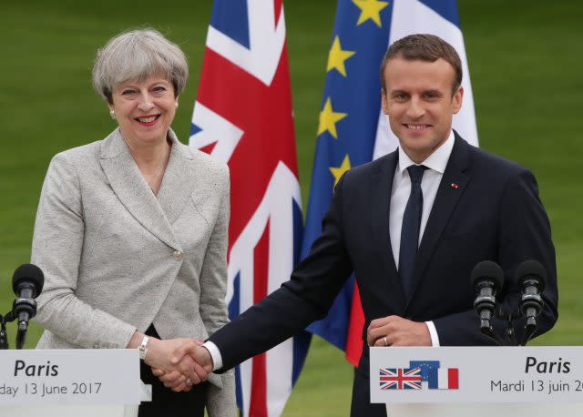 Mrs May and Mr Macron. (Yui Mok/PA)