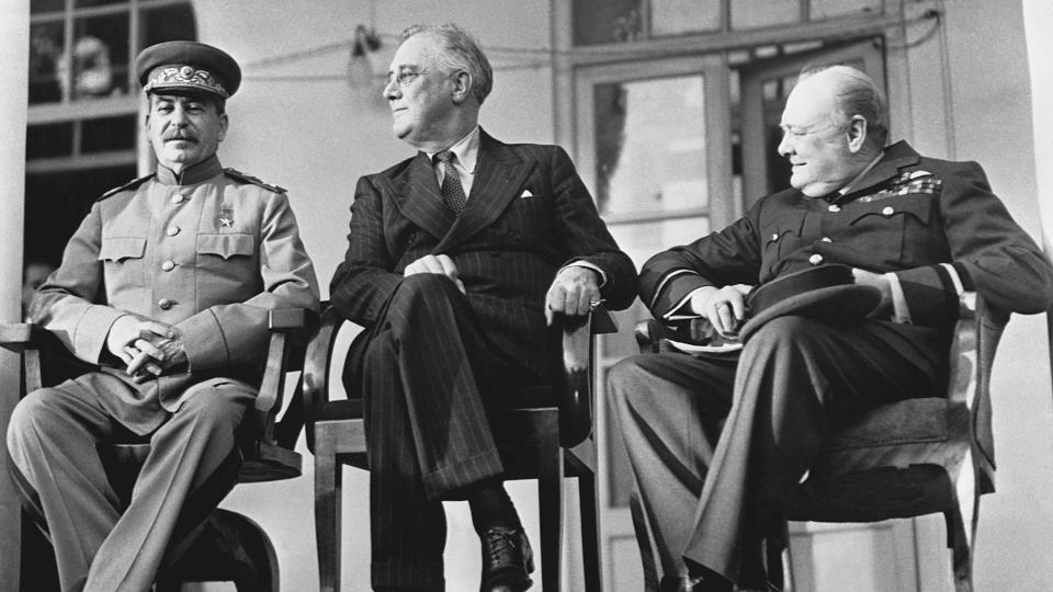 Soviet Premier Josef Stalin, U.S. President Franklin D. Roosevelt, and British Prime Minister Winston Churchill attend the Tehran Conference in 1943.  / Credit: © CORBIS/Corbis via Getty Images