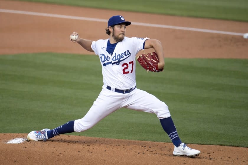 Los Angeles Dodgers starting pitcher Trevor Bauer winds up during the first inning of the team's baseball game.